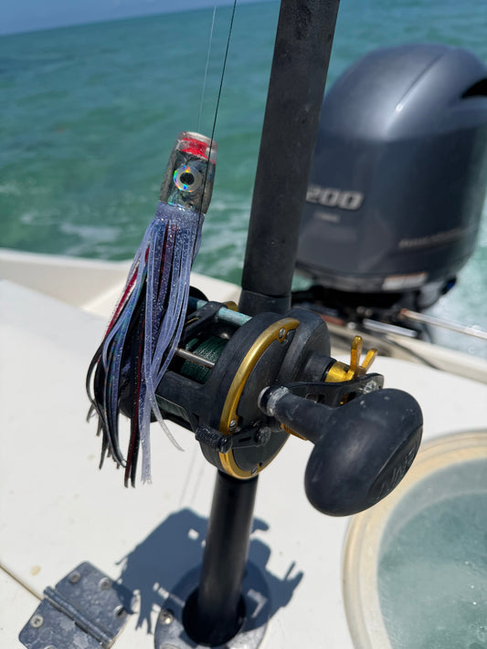 Handcrafted offshore trolling lure ready to be dropped in the water