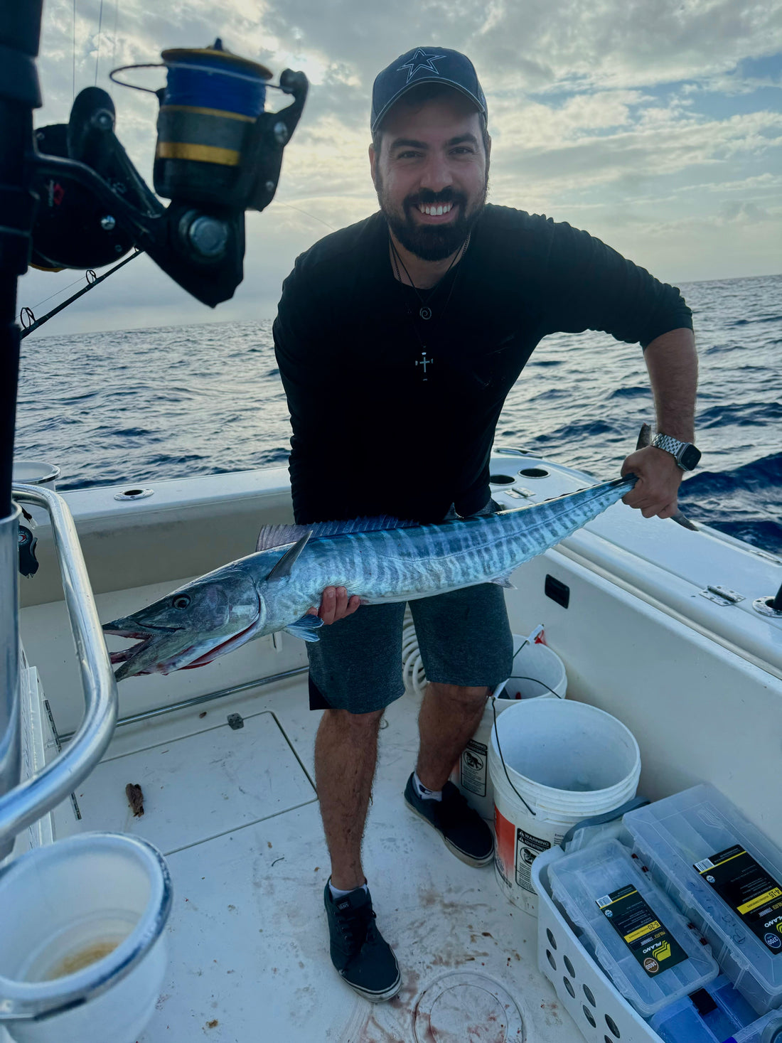 handsome guy holding a fish