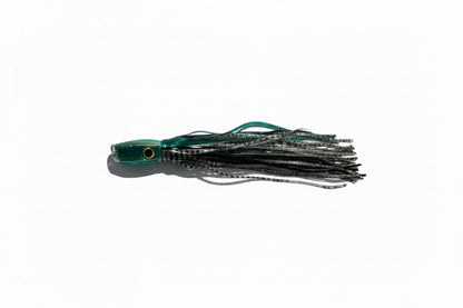 Green and black abalone resin offshore trolling lure with skirt for tuna and marlin fishing