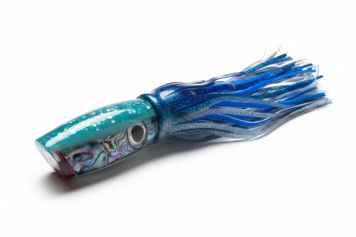 Blue and silver squid fishing lure on a white surface