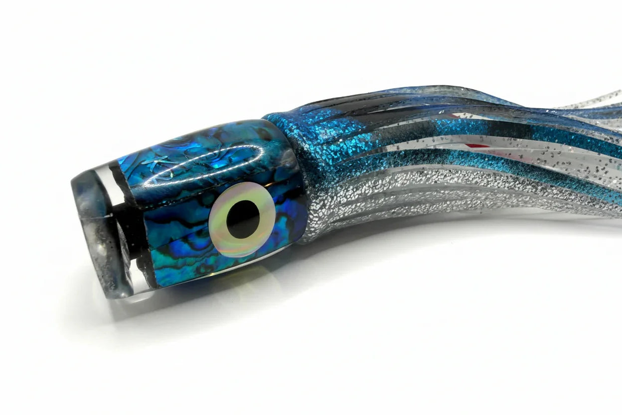 Blue and silver abalone resin offshore trolling lure with reflective eye detail