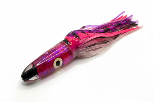 Pink and Black squid fishing lure on a white background