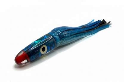 Blue and red squid fishing lure on a white background