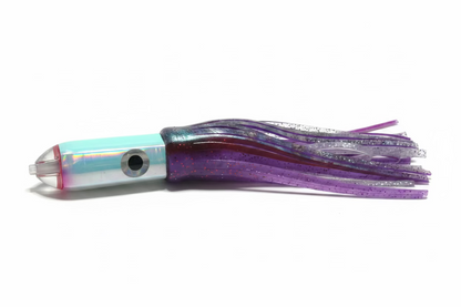 A plastic fishing lure with a light blue and white striped head, a red accent ring, and a translucent purple skirt with glitter, resting on a beige fabric surface.