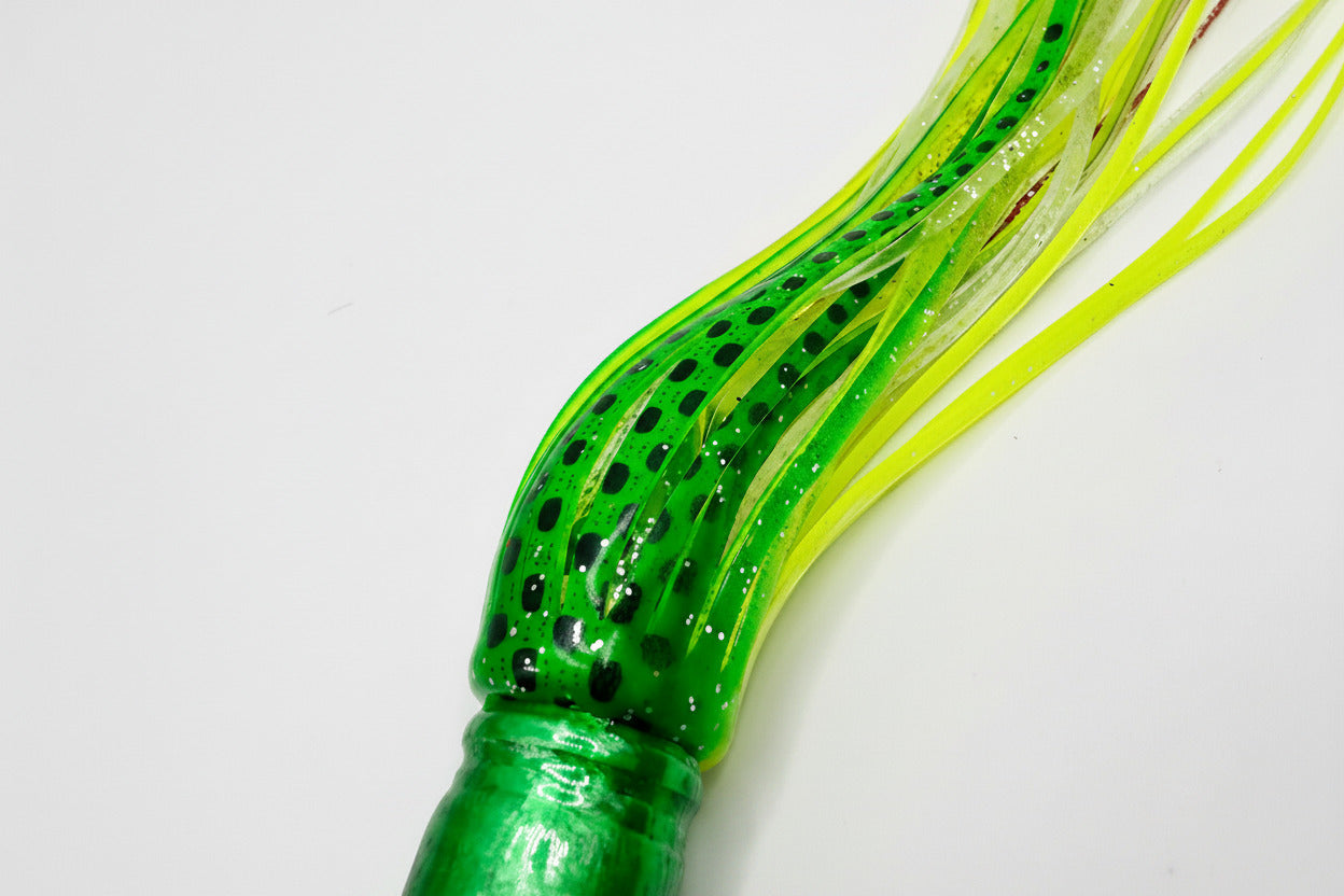 Green and yellow offshore trolling lure with black spots for tuna and marlin fishing