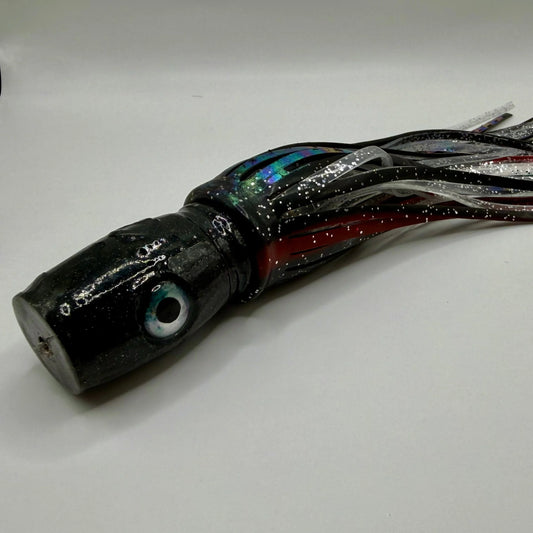 Black abalone resin offshore trolling lure with lifelike eye and glitter skirt for tuna fishing