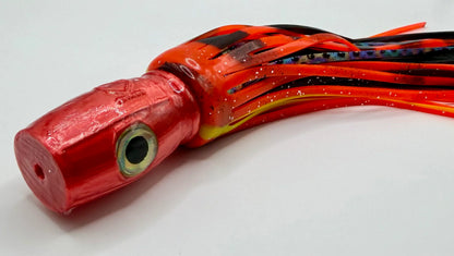Offshore trolling lure with red abalone resin head and multi-colored skirt for tuna fishing