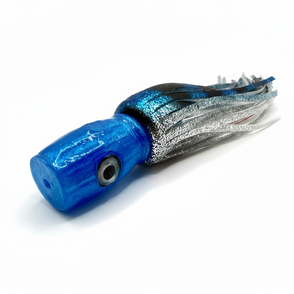 Blue and silver offshore trolling lure with abalone resin head and realistic eye on white background