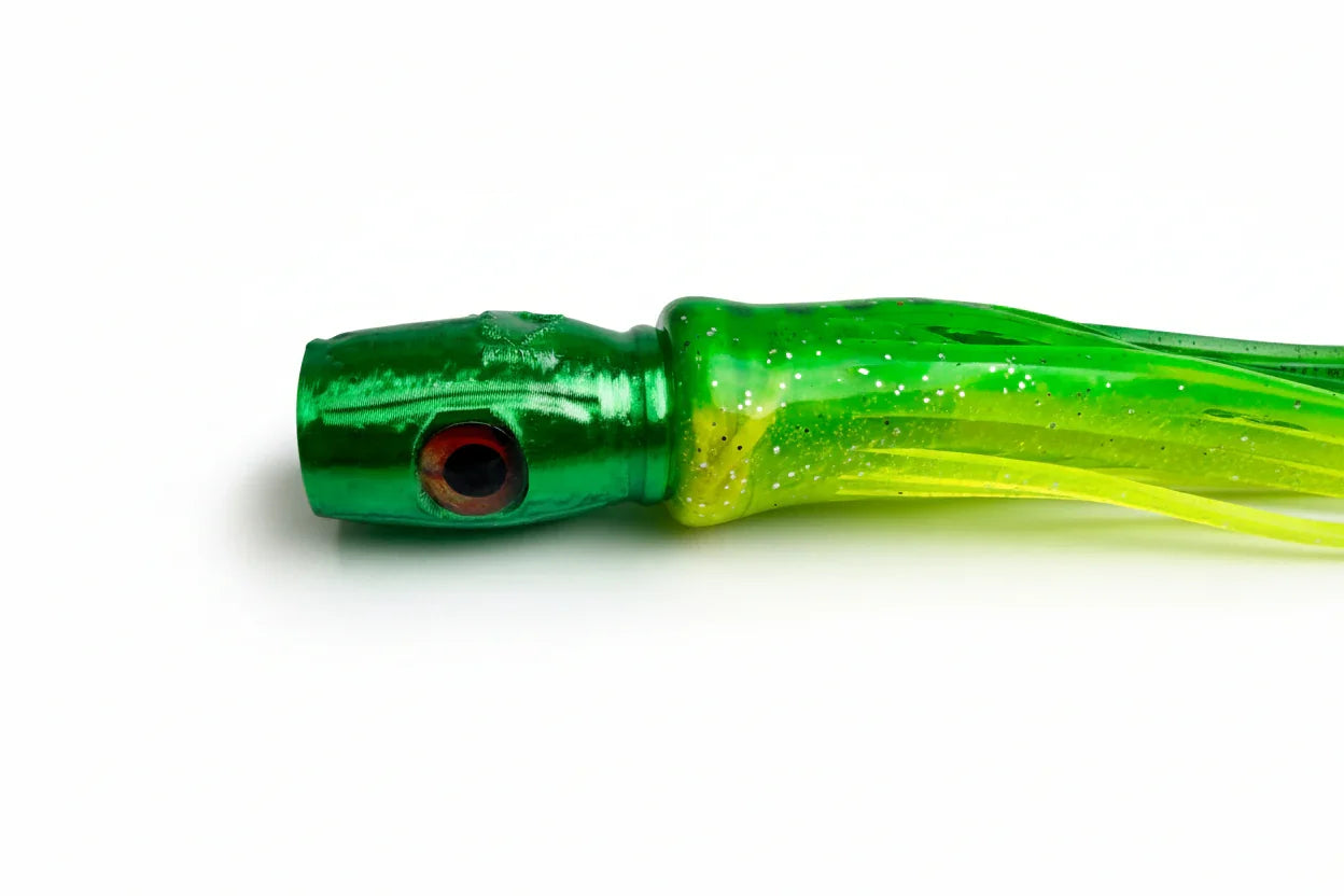 Green and yellow offshore trolling lure with lifelike eye and glitter skirt on white background